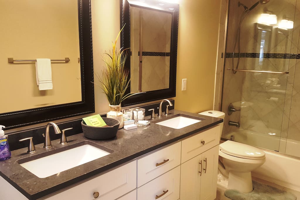 An en-suite bathroom has a double sink so space is never an issue.