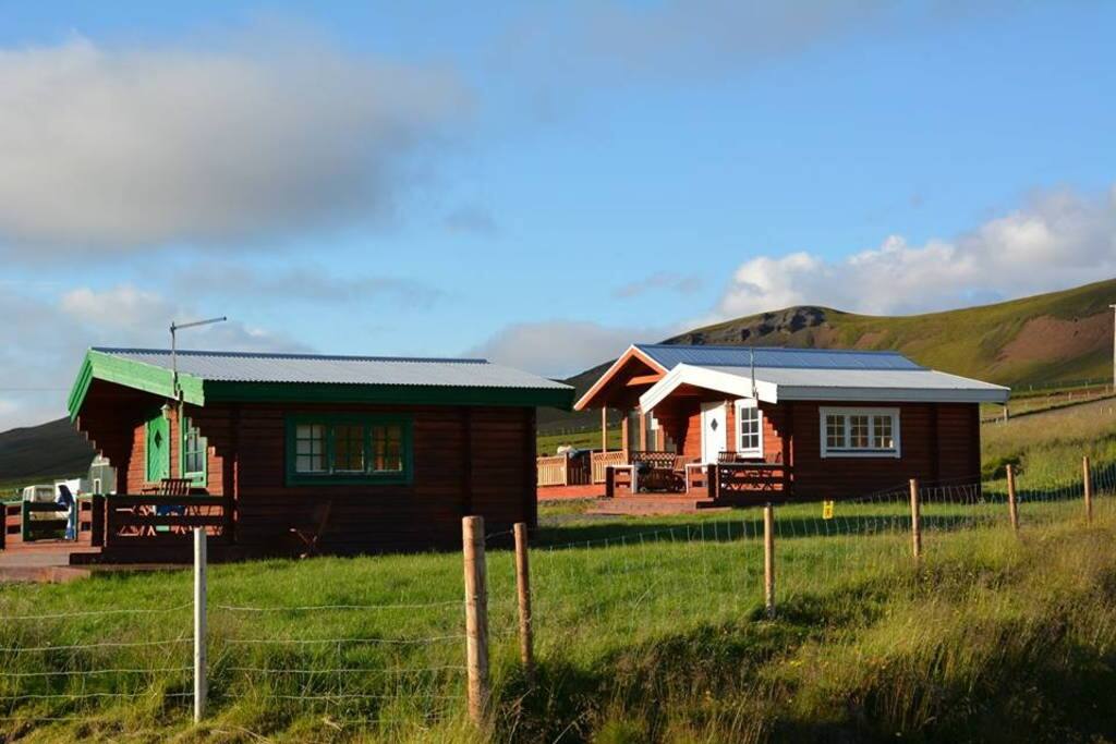 The three wooden cottages