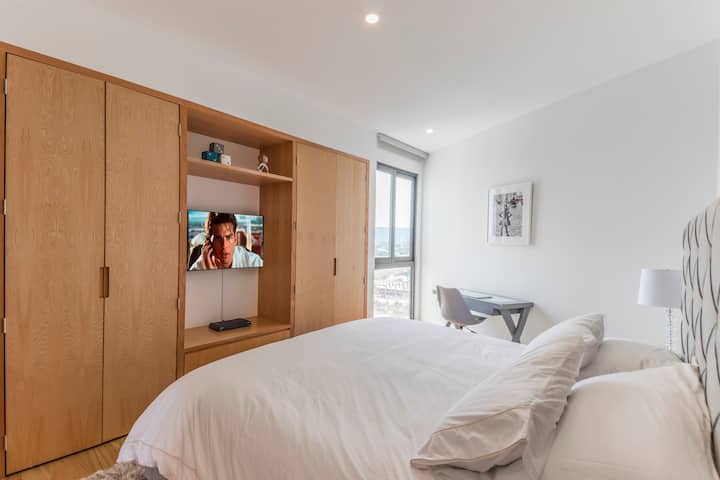 Bedroom #2 with 40' 4K LED TV with desk and chair.