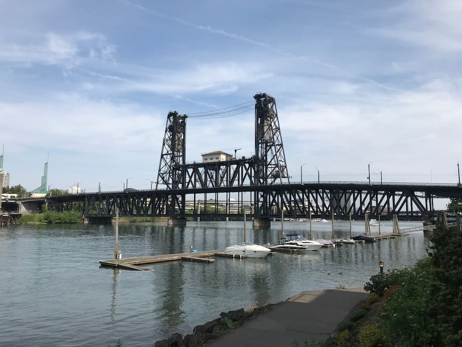 Property sits between the Steel and Broadway Bridges along the Willamette River. Steps from easy walks/cycle rides all along the West Side of the Riverfront of Downtown Porland. Pedestrian crossing over to East side of River on lower part of the Steel Bridge show above.