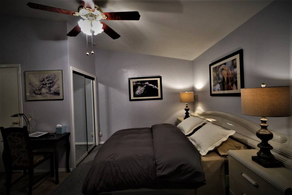 Our queen size bed is comfortable for two adults or 3 petite adults .