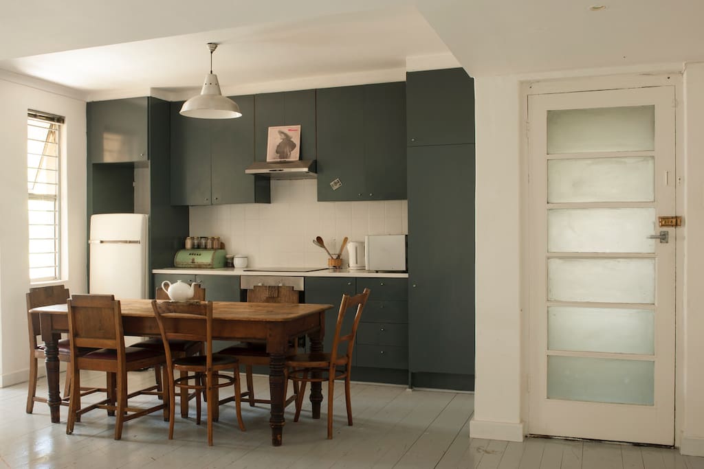 The kitchen where you can prepare a meal, brew some coffee or use the table as a workspace.