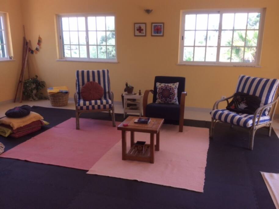 The sitting room. Nice sunny Space with outdoor patio access.
