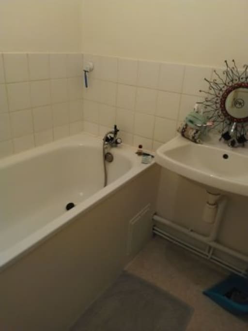 Washrooms and bathroom in the same room.