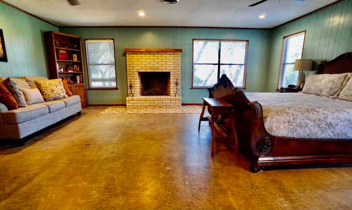 Los Arcos King Suite with queen sleeper sofa and a private chimney. 