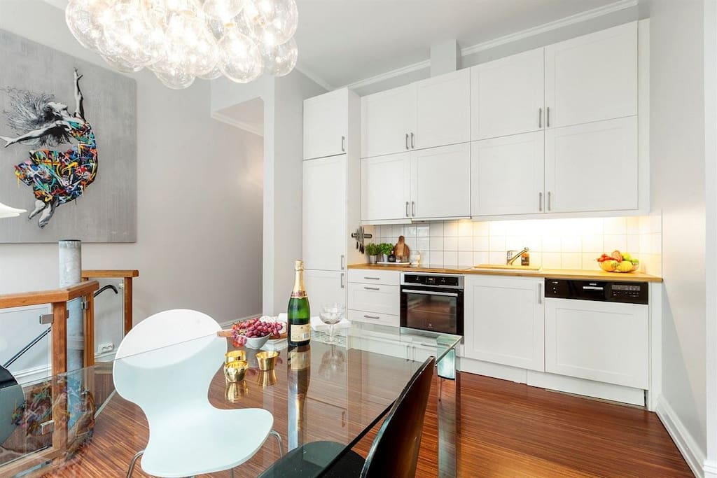 Large dining table and kitchen