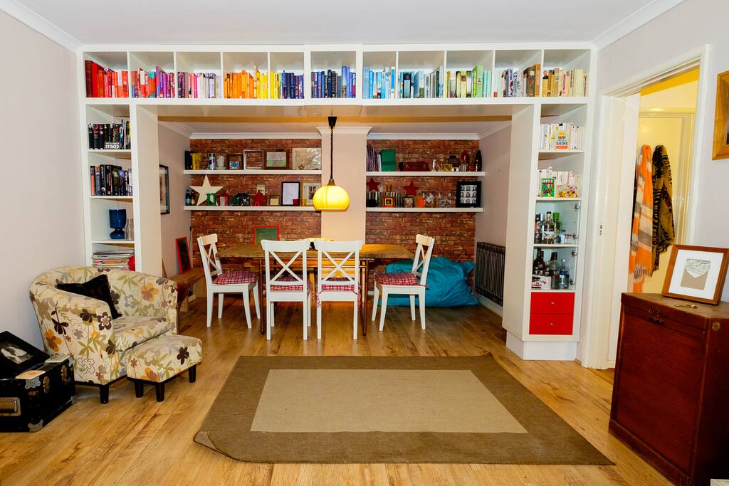 Fun and colourful living room with dining area