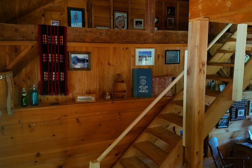 The converted barn has lots of different levels to explore. Hand-hewn post-and-beams are exposed throughout the house.