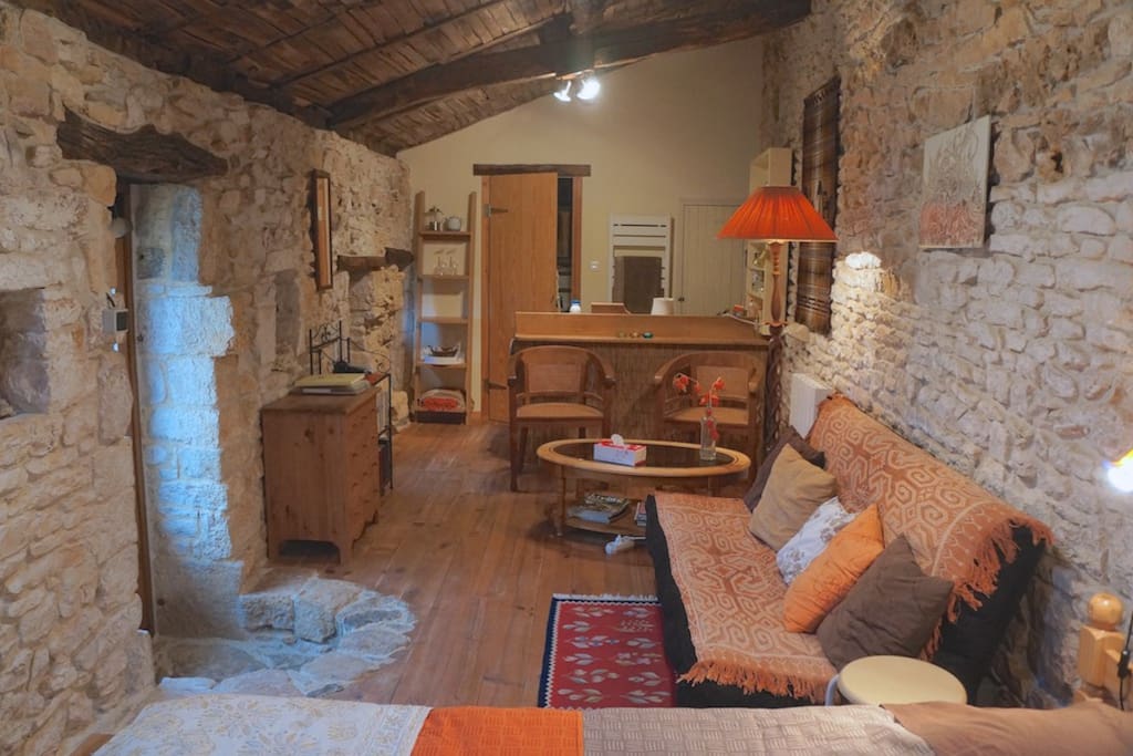 Sofabed & seating area in gite