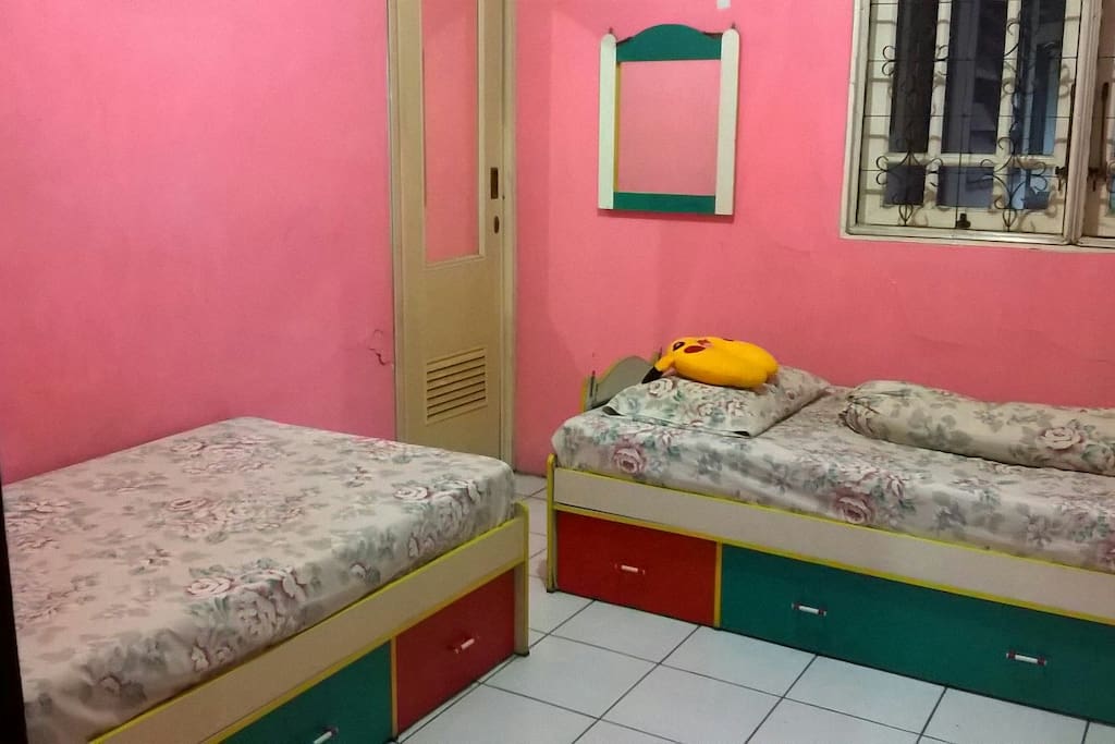 Kids room with 2 single bed