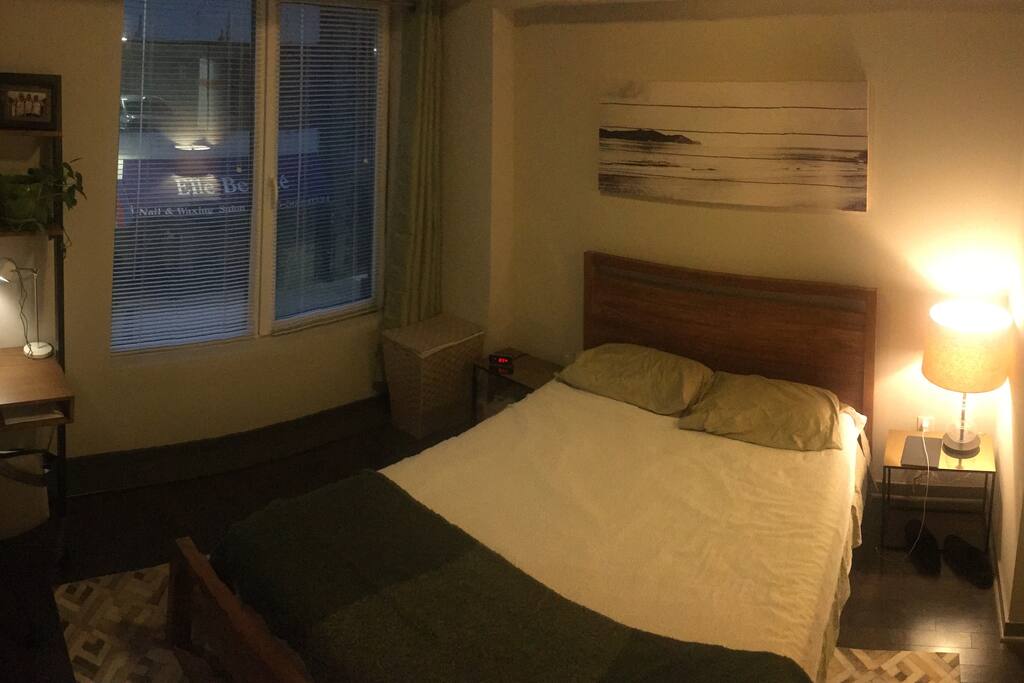 Queen size bed, blinds & curtains, small desk for work