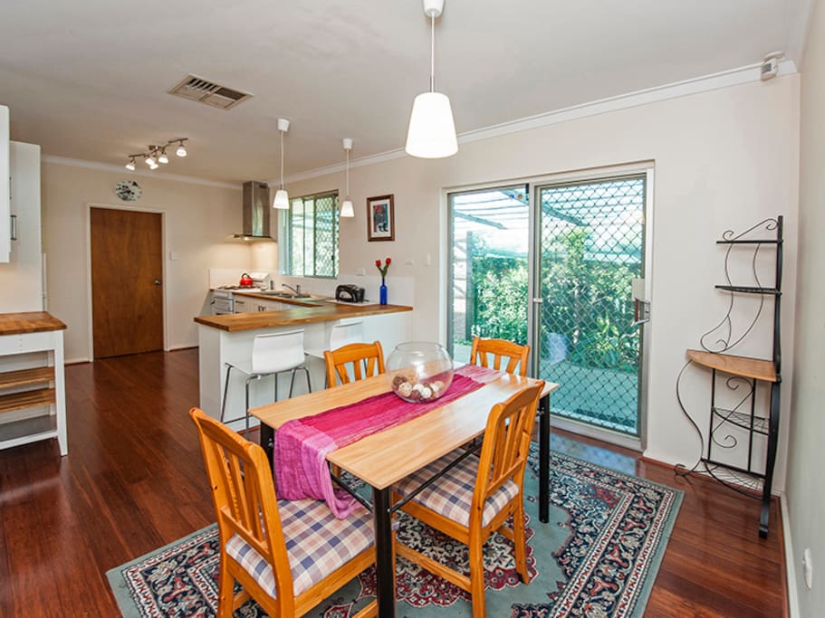 Dining area adjoining the back patio and kitchen