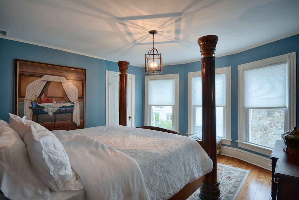 King Poster bed Bedroom across from King Master bedroom with side views