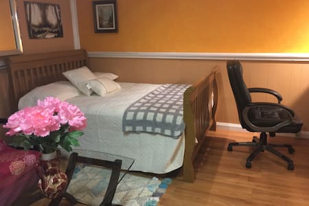 Private bedroom, shared bathroom and living room