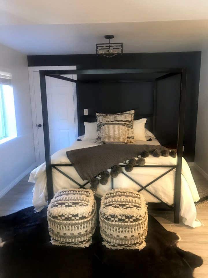 Master bedroom, queen size canopy  bed. French doors provide a quiet,  private space.  For those needing additional sleeping space, a  queen-size blow-up mattress maybe provided upon request.  