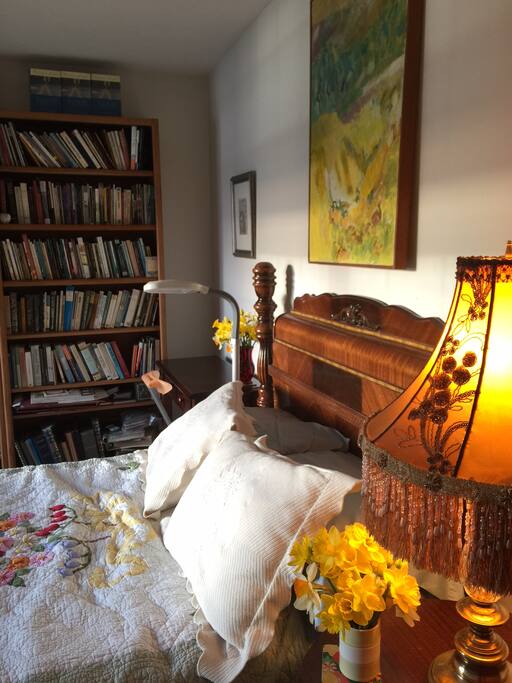 Bed & desk & books.