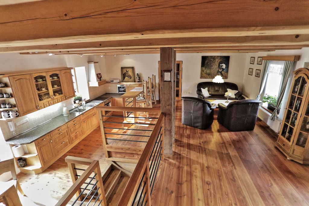 1st floor - lounge with a large modern fully equipped kitchen (oven, stove, dishwasher, fridge, freezer etc.) with an exceptional view of the millwheel. Likewise, there is a bar, dinnette corner and entry to the spacious patio.