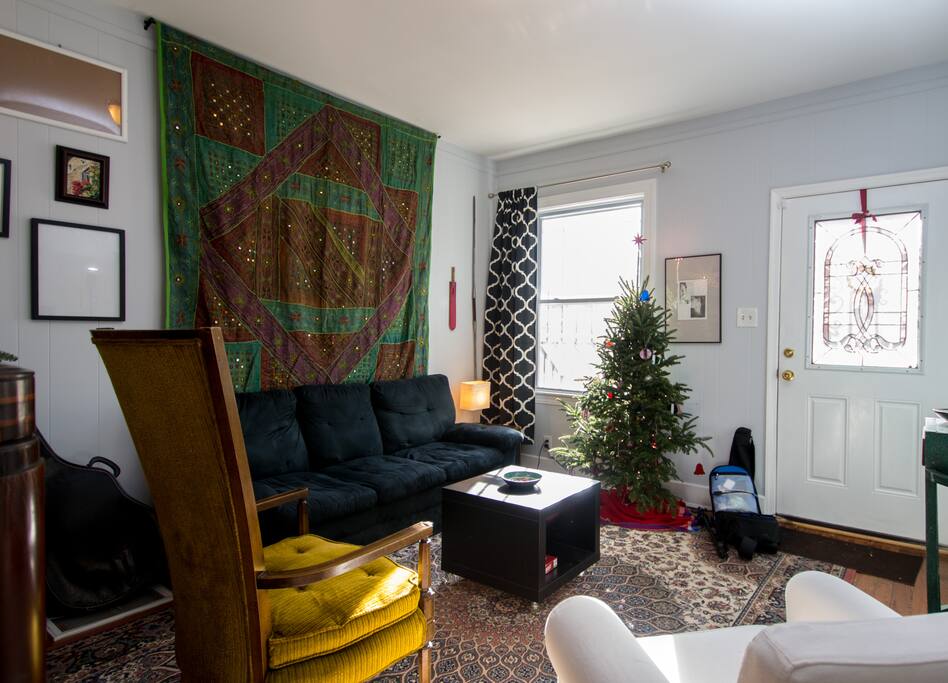 Our sunny front room... curl up with a book or have a game night!