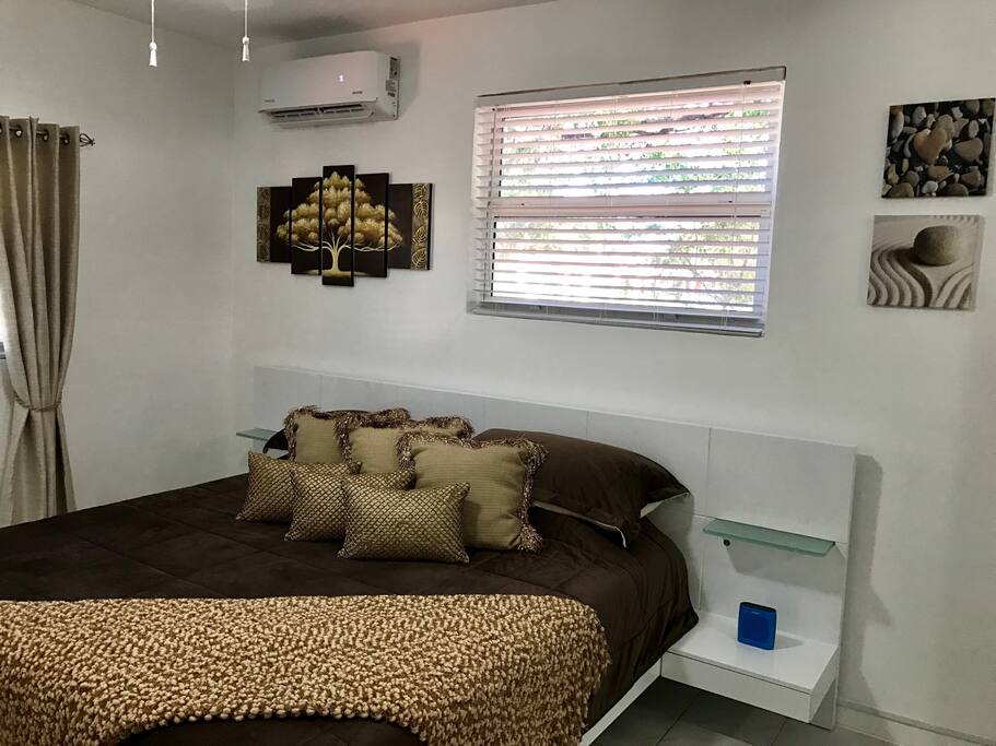 There is a modern decor and Bose Bluetooth Speaker for your entertainment!!