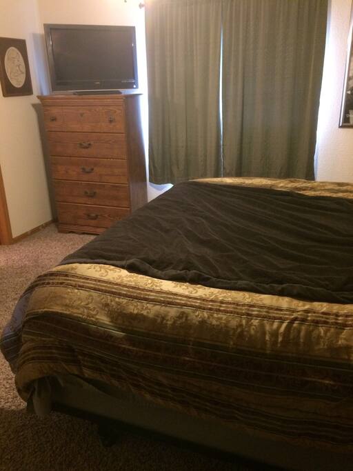 Master bedroom w/ king size bed