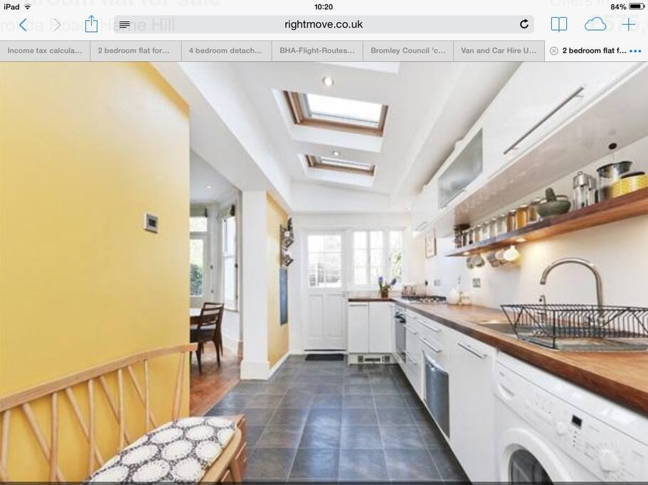 Very light modern kitchen with usual amenities
