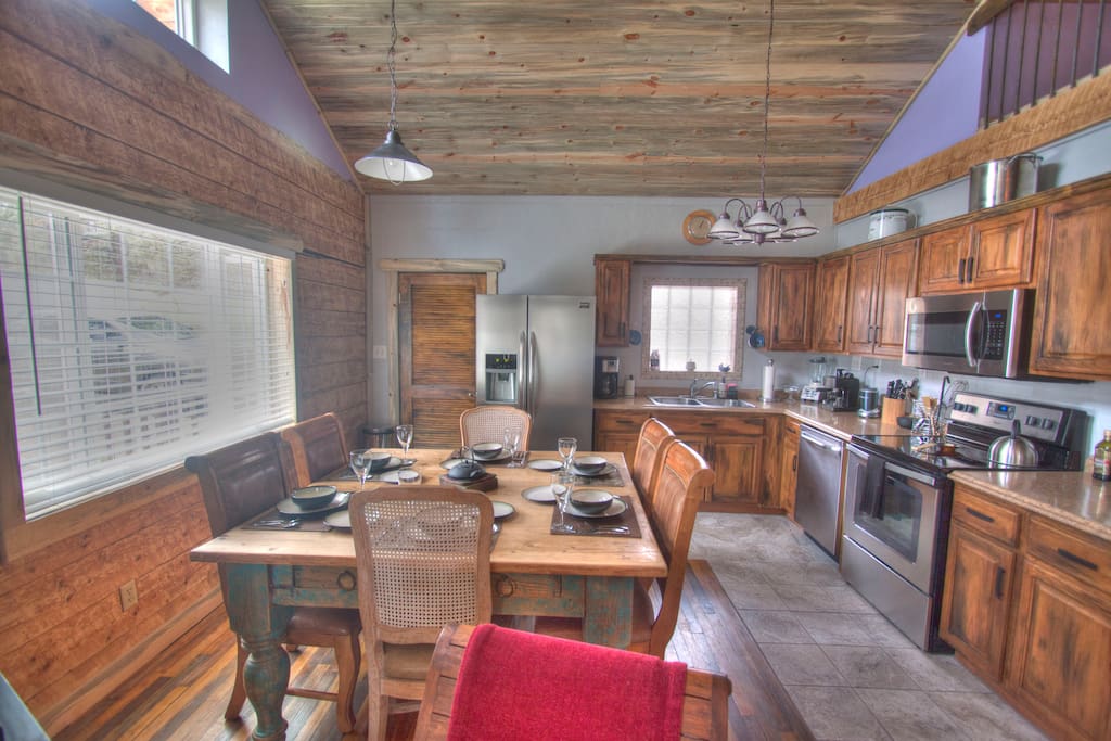 Large open kitchen with all new stainless steel appliances