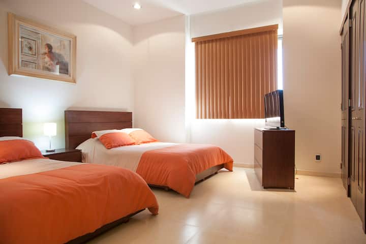 Recamara con dos camas matrimoniales