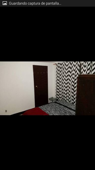 Room with full bed and closet