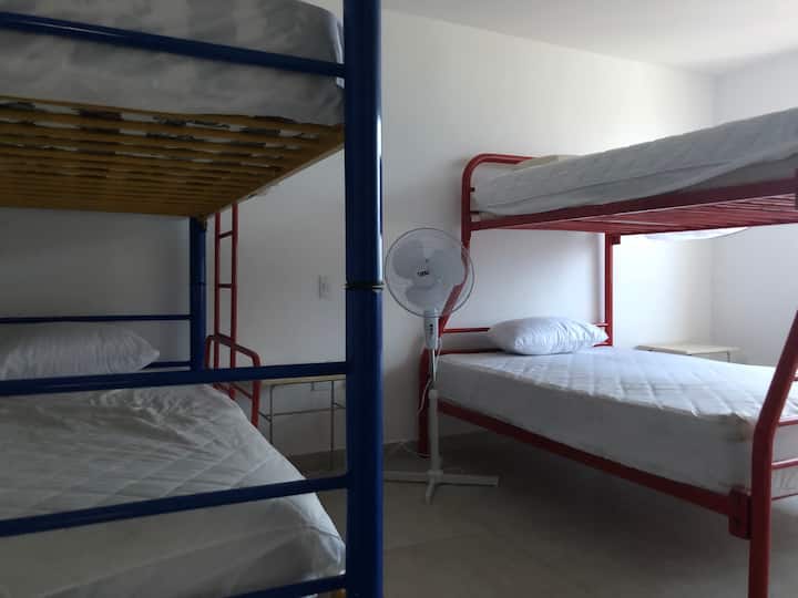 2nd Room (Floor 1)

1 double bed 
3 beds and a half 