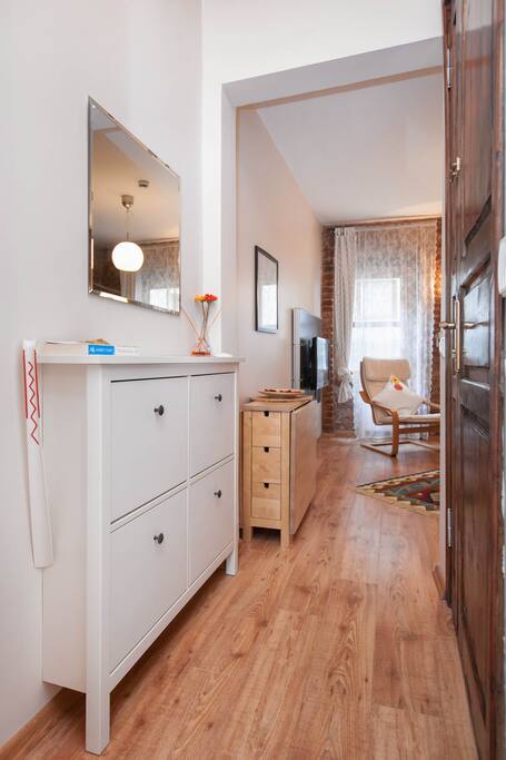 The entrance to the flat, up from is the living room and behind this view are the restroom and the bedroom.
