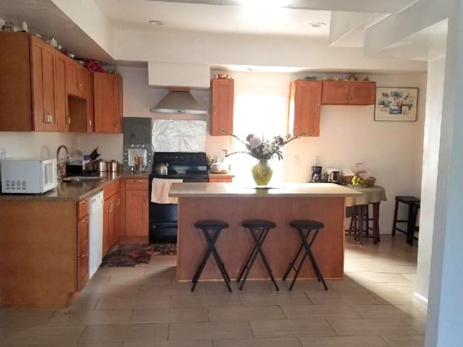 My home has a fully-equipped kitchen with a dining space.