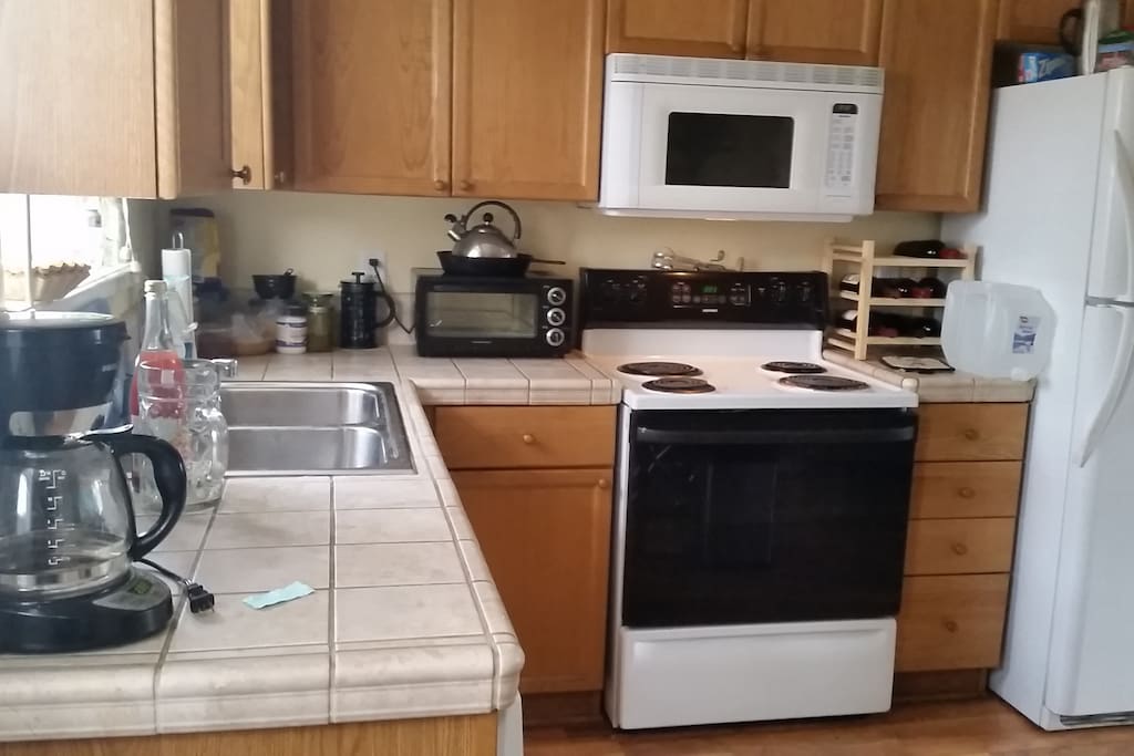 Kitchen - if you're nice, we'll probably cook and share wine or cocktails with you.