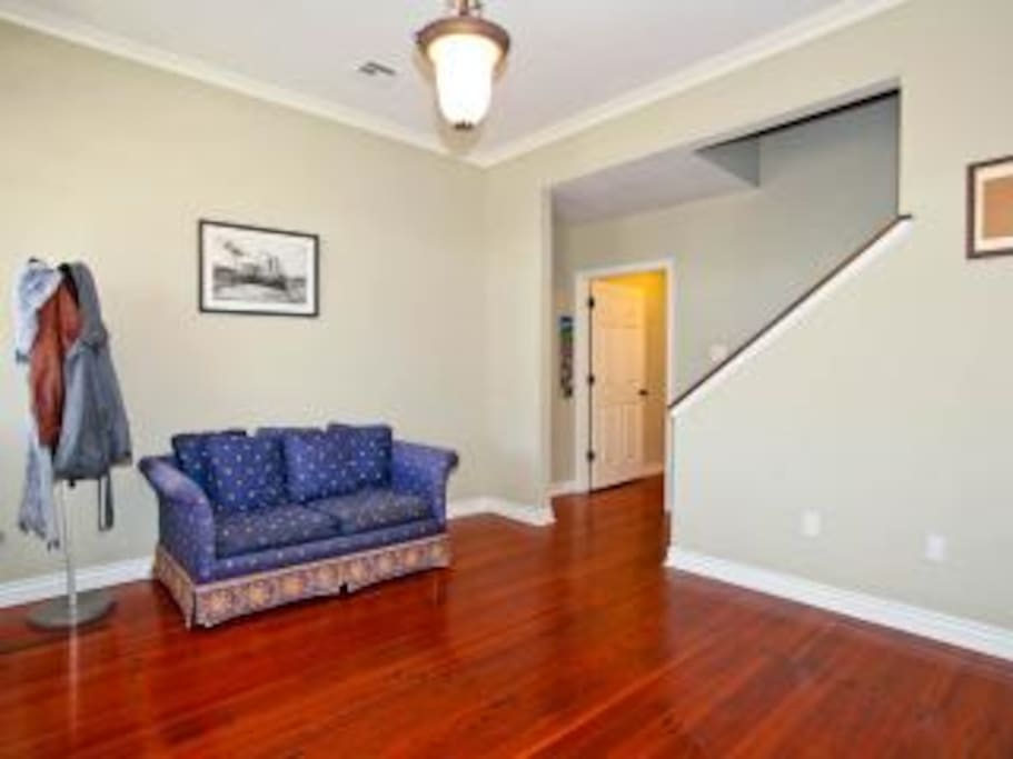 Foyer note stairs lead to upstairs host master suite.