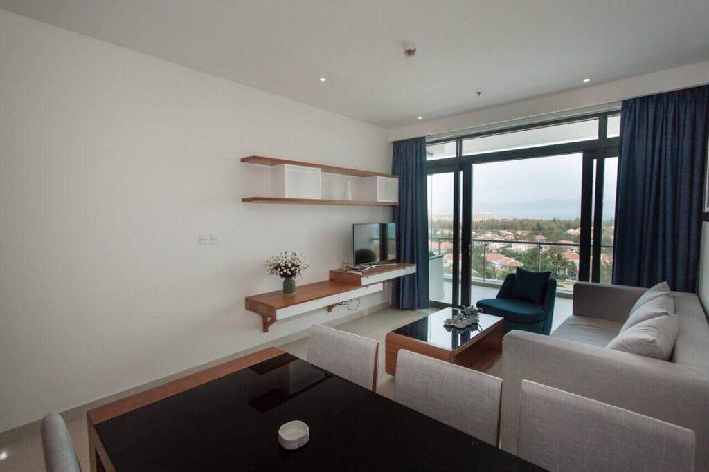 Living room with an ocean view and balcony