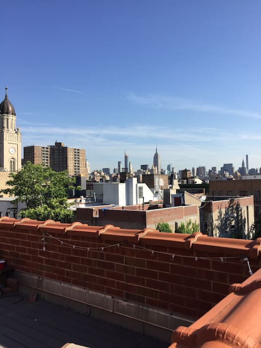 Amazing PRIVATE rooftop w/ North View of NYC. Have coffee in the AM or unwind with wine in the PM