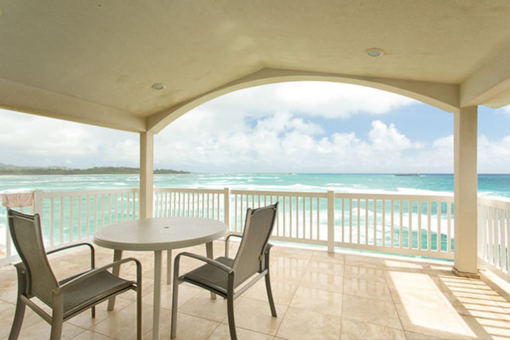 Private second floor lanai off the master bedroom. You can look straight down into the water.