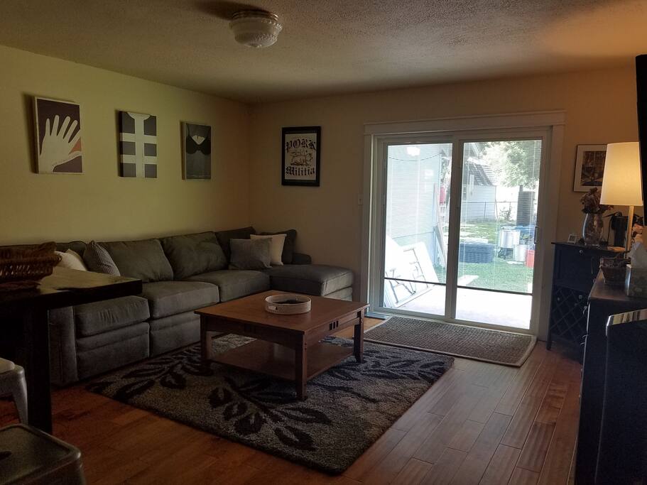 Spacious living room/3rd bedroom. This sofa pulls out into a full size memory foam bed.