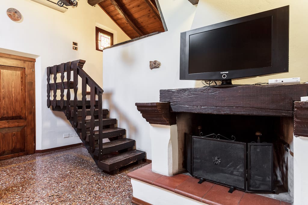 Stairs to the first bedroom with bathroom