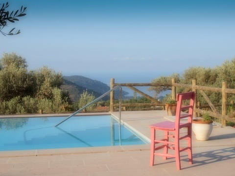 Private villa and pool near beach.