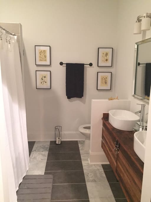 Downstairs en suite master bath with a jacuzzi tub.