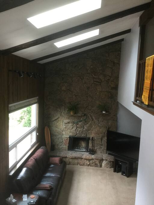 Den with cathedral ceilings