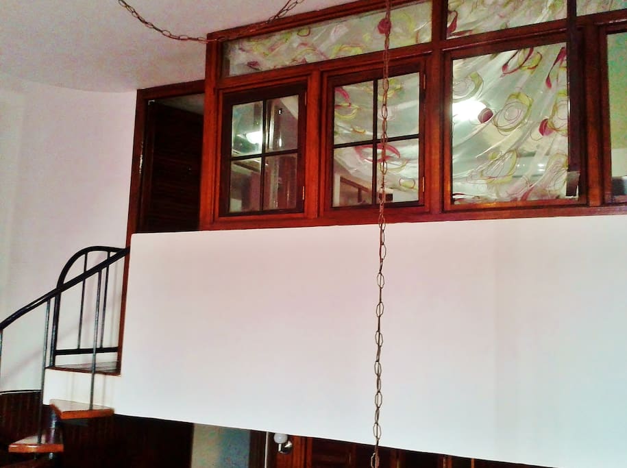 View from the living room towards the bedroom upstairs