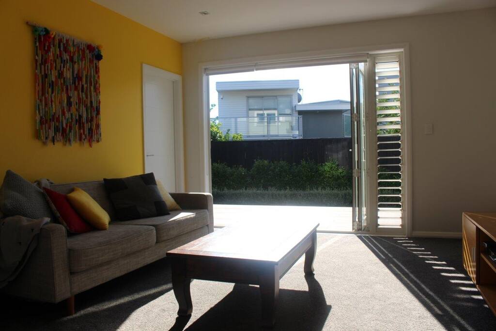 Sunny lounge looking out to garden