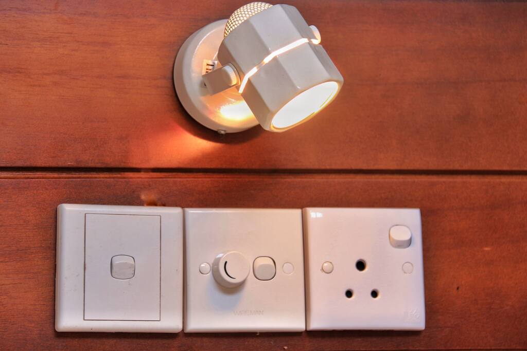 Charging devices and other switches at bed head
