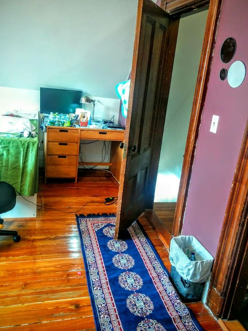 The front of the room, and a second desk.