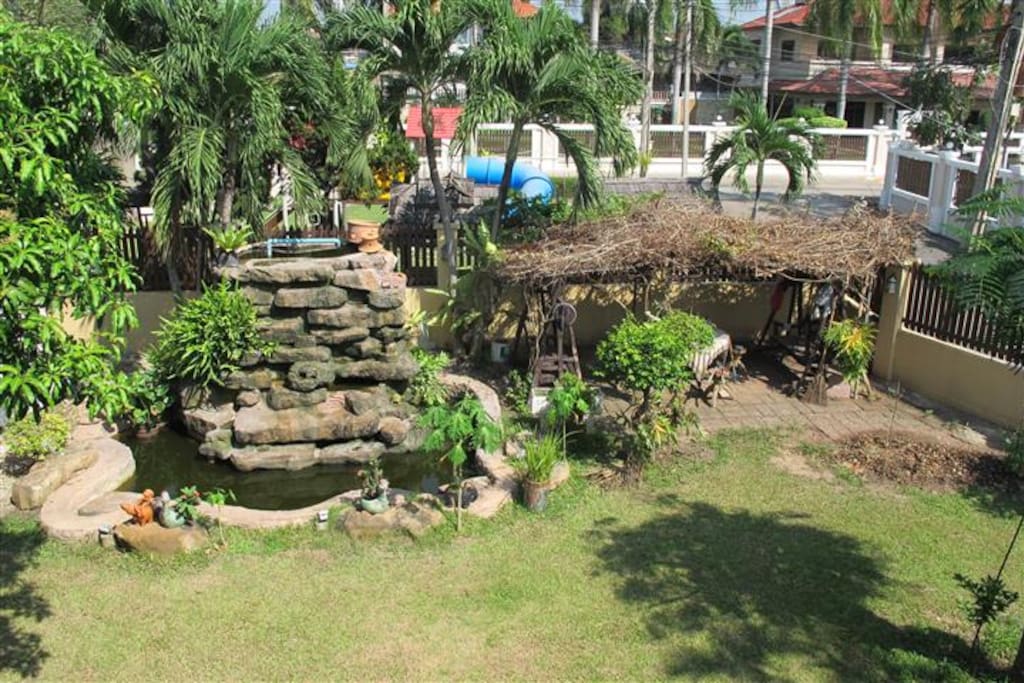 Koy carp pond with running waterfall feature