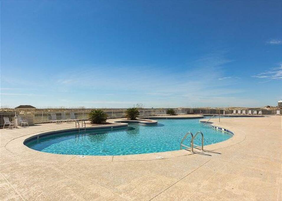 After a day on the sand, cool off in the sparkling
shared pool.