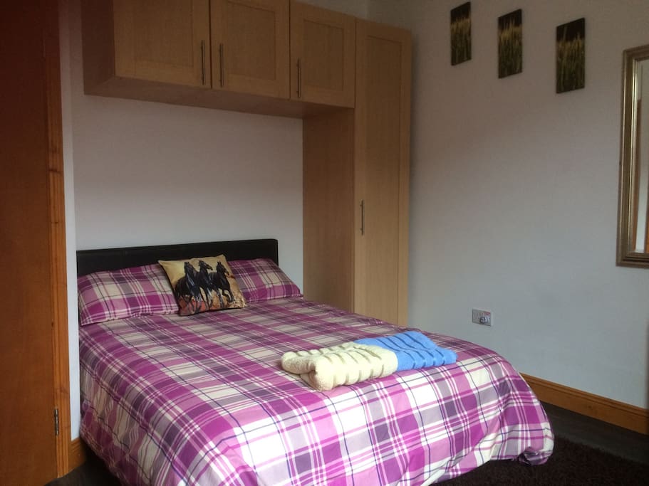 Laundered bed linen with towels supplied. Double bed with king size duvet for added comfort.