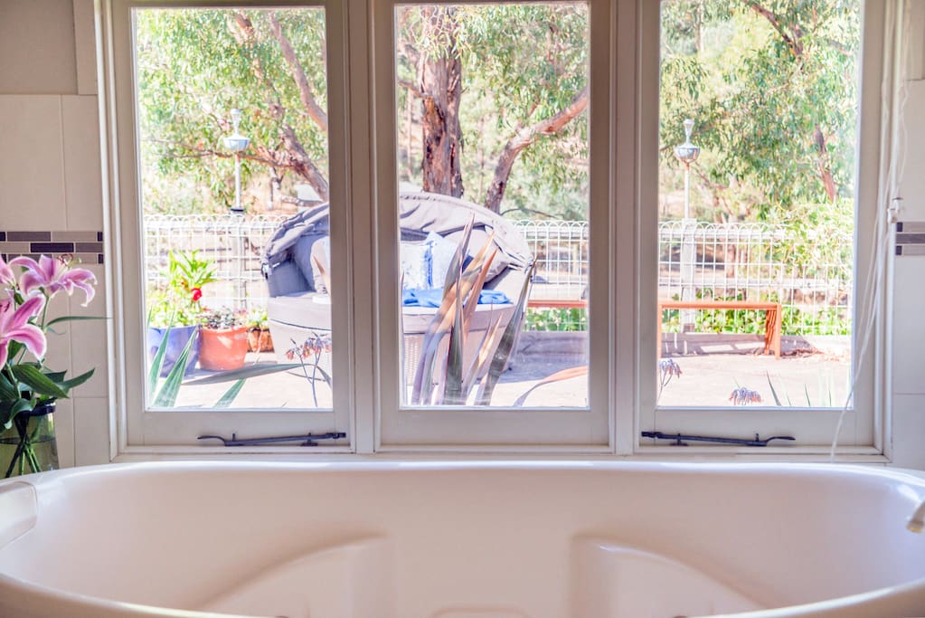 Luxury 2 person spa bath with view on to private terrace