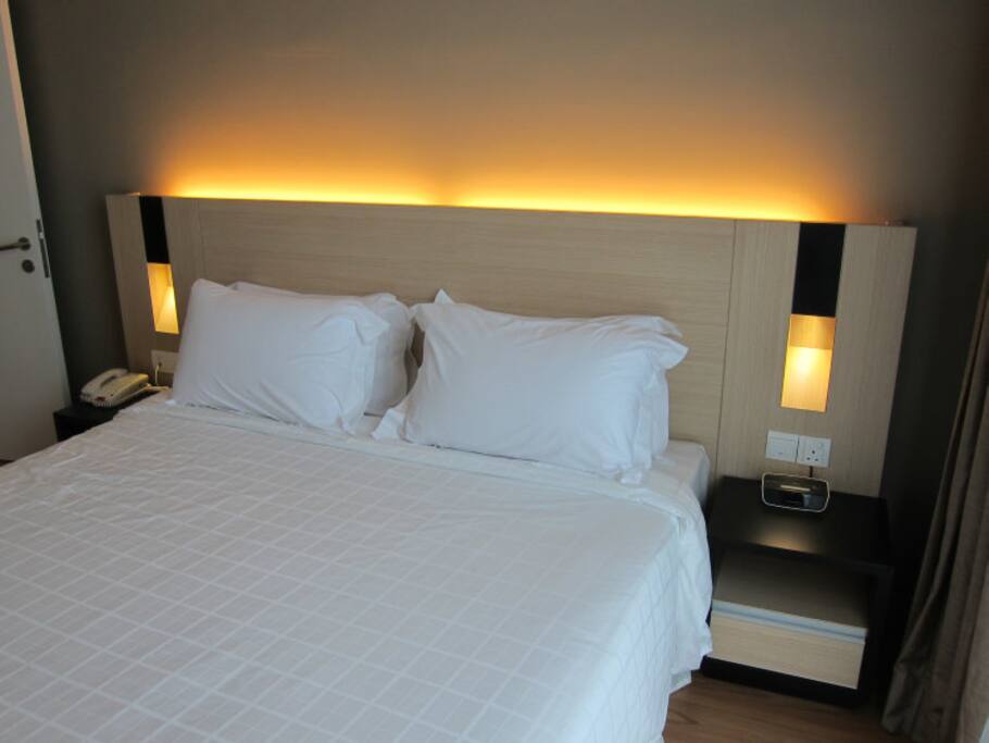 King size bed in master room with comfy mattress & pillows